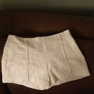 Form fitting shorts with zipper on the side.